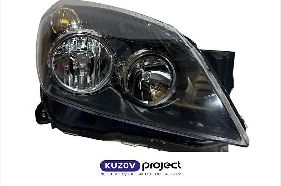 Фара правая черная с электрическим корректором Opel Astra (H) 2004-2014 (TYC / Тайвань)